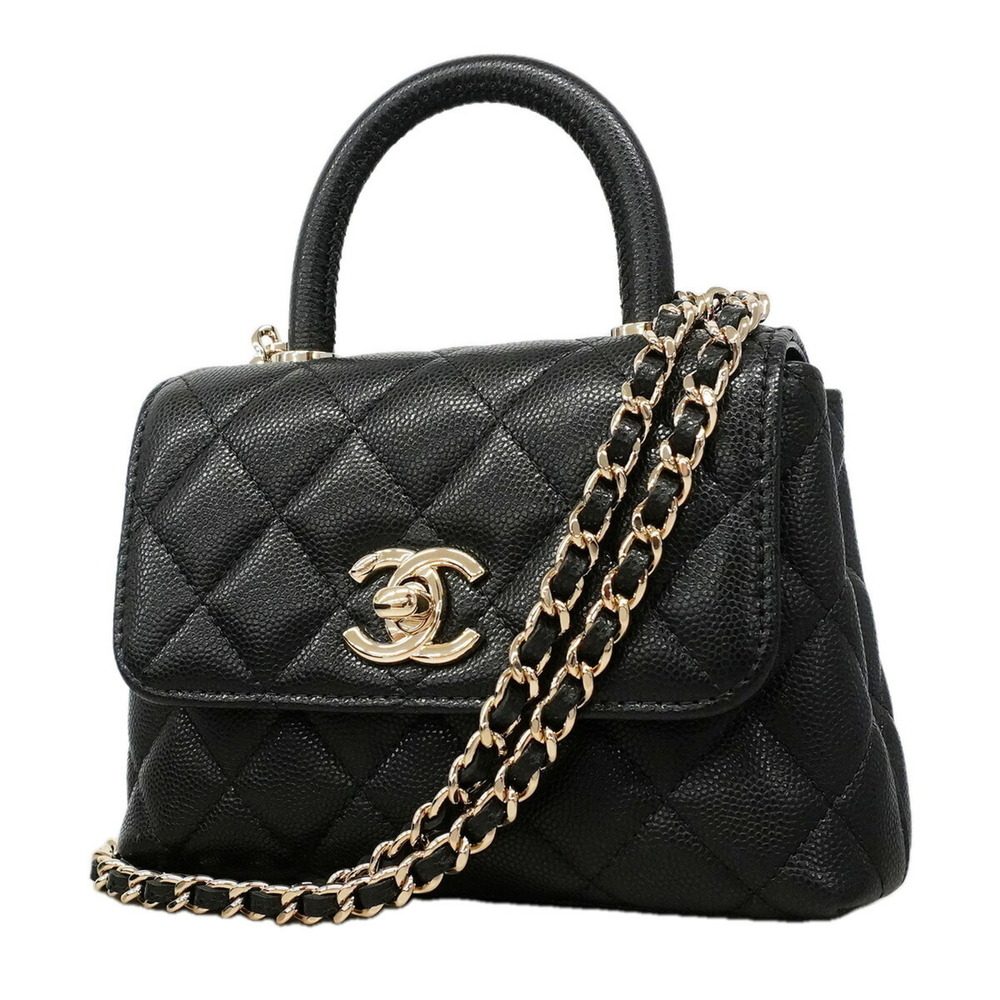 Chanel handbag, chain shoulder bag, Coco handle, caviar leather, black/champa...